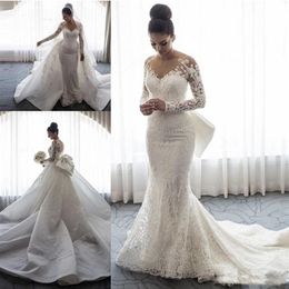 2021 Luxury Mermaid Wedding Dresses Sheer Neck Long Sleeves Illusion Full Lace Applique Bow Overskirts Button Back Chapel Train Go306K