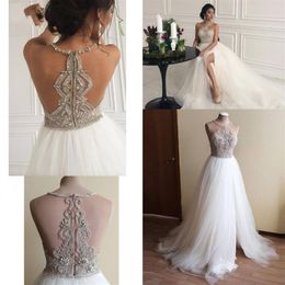 dubai spiaggia senza maniche in rilievo di cristallo abiti da sposa real pos halter aline tulle alta spacco abiti da sposa robe de mariee240D