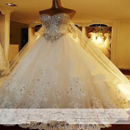 2021 Luxury Sexy Arabic Luxury Ball Gown Wedding Dresses Bridal Gowns Sweetheart Illusion Lace Appliques Crystal Beads Royal Train211P