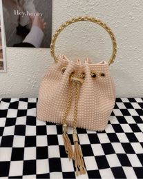 Full diamond hand inlaid diamond ceramic beads bucket bag metal Sequin tassel shiny candy color handbag female 230401