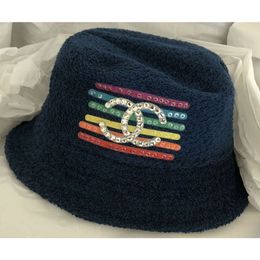 Chanles lady luxury Knitted hat Out of print limited edition co branded PHARRELL Beaded Colorful Horizontal Bar Big Blue Fisherman HatWinter fashion wear