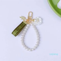 Designer Keychain Luxury Designer Keys Pendant Key Buckle Classic Letter Fabric Pearls Chain 4 Styles Keychains Ornaments