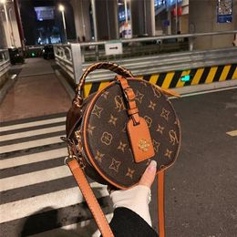 2021ss New Style Lady Fashion Bag Patchwork Genuine Leather Classic Retro All-match Simplicity Two-color Stripes Round Cake Should328Q