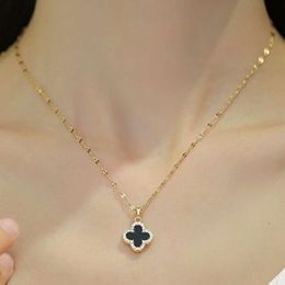 Clover necklace designer four-leaf clover titanium steel women's necklace new fashion double-sided pendant senior sense sweater chain