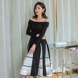 YIGELILA Spring Fashion Women Black Dress Slash-neck Long Sleeves Elegant A-line Dress Dinner Party Dress Mid-calf 65241