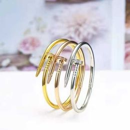 famous brand Nail Bracelet Titanium Steel 18k Electroplated Rose GoldS teelC olorD iamondE mbeddingS implea ndP ersonalizedJ apanesea ndK oreanE ditionC olo