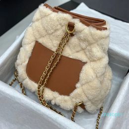 2023-Brand Designer Backpack Genuine Mini Headphone Bag Fashion Womens Metal Letter Wool Bucket Book bag Backpack Luxury Chain Mother Small Backpack