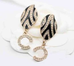 2023 Luxury quality Charm drop earring with sparkly white diamond oval shape design have stamp black style PS4794A