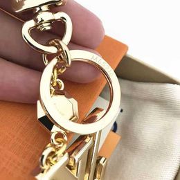 High quality Brand Designer Keychain Fashion Purse Pendant Car Chain Charm Bag Keyring Luxury Classic Mens Womens Letter Gold Black Buckle 203