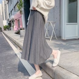 Skirts Knitted tights Women's twisted pleated umbrella tights Autumn/Winter High Waist Thin Solid A-line crotch midi tights 230403