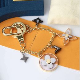 Keychains Lanyards Luxury Designer chain Fashion Classic Brand Buckle Letter Design Handmade Gold Mens Womens Bag Pendant Flower Ring Long Chains YT11