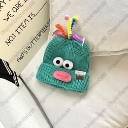 2023 Cute cute cute funny designer brand parent-child cashmere knitted woolen hat autumn and winter face small luxury cartoon warm ear hat new parent-child