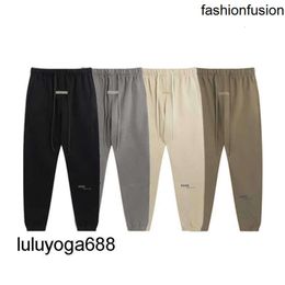 2023 New Fashion Mens Designer Pants ESS Men Women Solid Color Pant Trousers Motion For Male Casual Joggers Size pants sweat pants