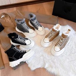 The concept of young designers is classic casual shoes with plush lining for comfort and warmth; Snow boots with soft leather trim create a feminine fashion runway sty