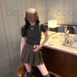 Skirts designer luxury High version Nanyou M half skirt 23 autumn versatile slim high waisted bird check short belt pleated XYBY