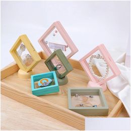 Jewellery Boxes Colorf Pe Film Jewellery Storage Box Ring Bracelet Travel Case 3D Floating Frame Dustproof Display Drop Delivery Jewellery J Dhfbc