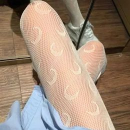 Socks Hosiery Women's Sexy Pantyhose Fishnet Tights Sexy Mesh Hollow Stockings High Elastic Letter Stockings Sexy Luxury Black Pantyhose T231104