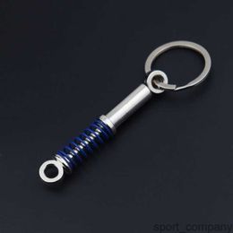 New Fashion Car Shock Absorber Keychain for Car Lovers Creative Unisex Car Bag Metal Spring Keyrings Pendant Gifts