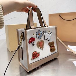 2023 Designer leather Crossbody Shoulder Bag Cartoon mascot Bags brand Hobos Luxury Fashion Ladies The Totes Bag Wallet Purses White pink Field tote