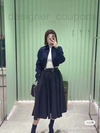 Skirts designer luxury P 23 Spring and Summer New Temperament Fashion Belt Design High Waist Slim pleated Mid-length skirt U599