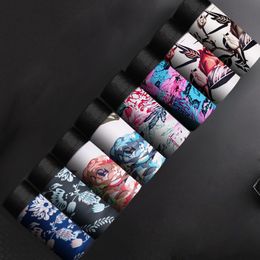 Underpants Men's Underwear Ice Silk Trackless Men's Underwear Breathable Sexy Boxer Printed Thin Underwear Comfortable Shorts L-4XL 230404