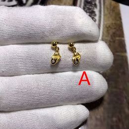 E64 S925 Sterling Silver Gold Plated Earrings Fashion Personalised Punk Street Dance Style Tongue Skeleton Head Cross Flower Letter Jewellery Design Gift for Lovers