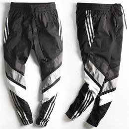 Men's Pants Spring Summer Sports Pants Men Tooling Pants Male Beam Feet Male Youth Version Closing Feet Nine Points Pants Casual Pant 230406