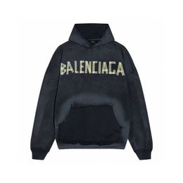 Balencaigaa High Quality Autumn and Winter Trendy Brand Paris Yellow Tape Letter Worn-out and Damaged Hooded Sweater for Men and Women Loose Zippered Jacket
