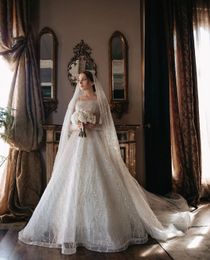 Elegant Ball Gown Wedding Dresses Bateau Long Sleeves Sequins Appliques Beaded Floor Length 3D Lace Ruffles Sparkly Zipper Bridal Gowns Plus Size Vestido de novia