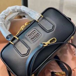 Designer miues bags New Leather Bowling Bag Trend Advanced Solid Colour Diagonal Straddle Handbag