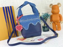 Japanische Cruiser-Handtaschen Designer-Tasche Blaue Monogramme Denim-Leder-Crossbody-Kompakt-Signatur-Herz-Tag-Schultertaschen Modische Tragetaschen M45970