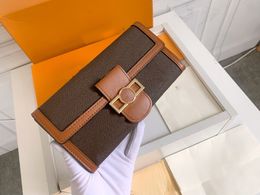 2024 Designer Buckle Wallet in Brown - Elegant Bifold with Secure Closure, Textured Leather, and Multiple Card Slots for a Timeless Accessory 68723