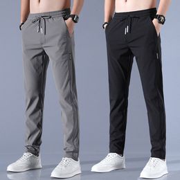 Men's Pants Spring Summer Ice Silk Men's Pants Loose Breathable Straight Casual Men's Tights Thin Quick Dry Tights Elastic Men's Sports Pants 230407