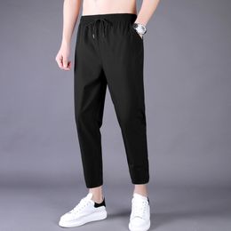 Men's Pants Men's Summer Thin Pants Korean Trend Nine Straight Tube Loose Ice Silk Elastic Sports Pants 230407