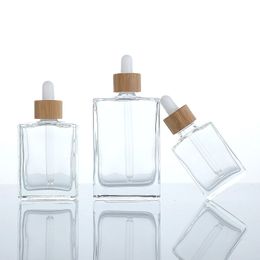 flat square rectangle luxury 15ml 30ml 50ml 100ml 4 oz glass dropper bottle with bamboo dropper cap for serum essential oil