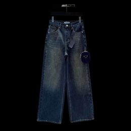 Pantaloni di jeans da donna di lusso Pantaloni casual con lettera triangolare Jeans lunghi strappati alla moda Abiti per quattro stagioni Qualità straordinaria con portamonete SML