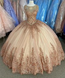 2023 Sexy Quinceanera Dresses Ball Gown Arabic Cap Sleeves Rose Gold Sequined Lace Jewel Neck Crystal Beading Sweet 16 Party Dress Prom Evening Gowns Sequins