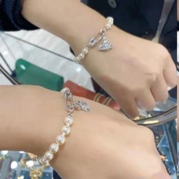 Beaded vivi west charm bracelets designer Saturn Hollowed out full diamond Pin Pearl bracelet for mens womens luxury jewellery orecchini