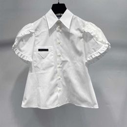 Luxury designer's new men's and women's short sleeved sportswear set Academy Triangle Label Blossom White Shirt Summer New Small Style Design Sense Short Sleeve Top