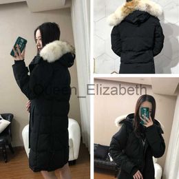 Womens Down Parkas Goose down coat Top Quality Women WINTER Parkas WITH HOODSnowdome jacket Real wolf fur Collar White DuckGOOSE factory clear Warm autumn fashion la