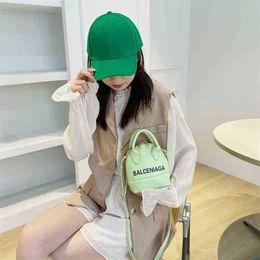 Designer bag 2023 summer tote 20% off Hot Urban female candy Colour stone letter portable style bright face shell