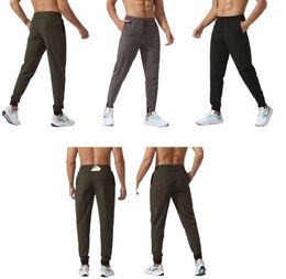 LUU womens Men's Jogger Long Pants Sport Yoga Outfit Quick Dry Drawstring Gym Pockets Sweatpants Trousers Mens Casual Elastic Waist Absorbent and breathable