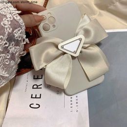 Case Stylish Phone Luxury Designer Fabric Petty Bow Phones Cases Triangle Brand Letter Unisex Womens iPhone 13 12 pro 7 8 X XS High Quality Phone case1