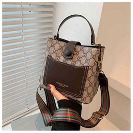 Designer bag 2023 summer tote 20% off Spring female Korean bucket shoulder Urban Simple temperament Messenger