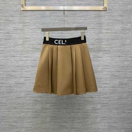 Luxury Designer women t shirt Shirt 2023 Early Spring Rubber Band Waist Pleated Half Lining Skirt Versatile