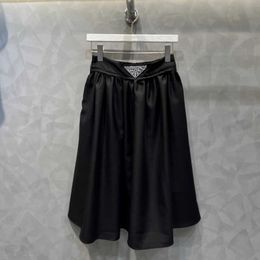 Luxury Designer Women's Triangle A-line T-Shirt with Large Swing Umbrella elastic waist skirt - Versatile Mid-Length Dress for Spring/Summer 2023 - Trendy Celebrity Style
