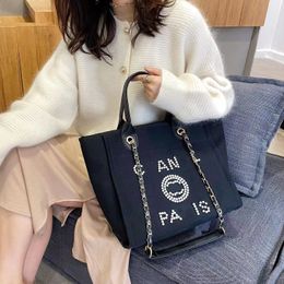 Women's Fashion Shoulder Bag Designer Crossbody Handbag 90% Factory Hot sale wholesale Canvas luxury Pearl tote bag brand Letter High Capacity Chain Beach bag