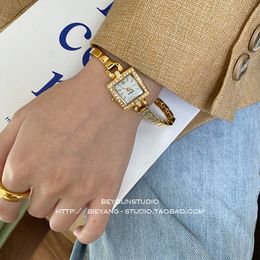 Women s Watches women s watch gold bracelet retro fashion square dial inlaid with diamonds small and fashionable for lovers 230410