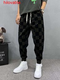 Fashion hilovable- Autumn/Winter New Men's Casual Pants High end Chequered Small Feet Harun Pants Tie Feet Social Spirit Kid Pant Trend