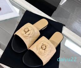 Genuine leather flower slippers women's outer wear new summer round toe flat flip flops comfortable heel beach sandals